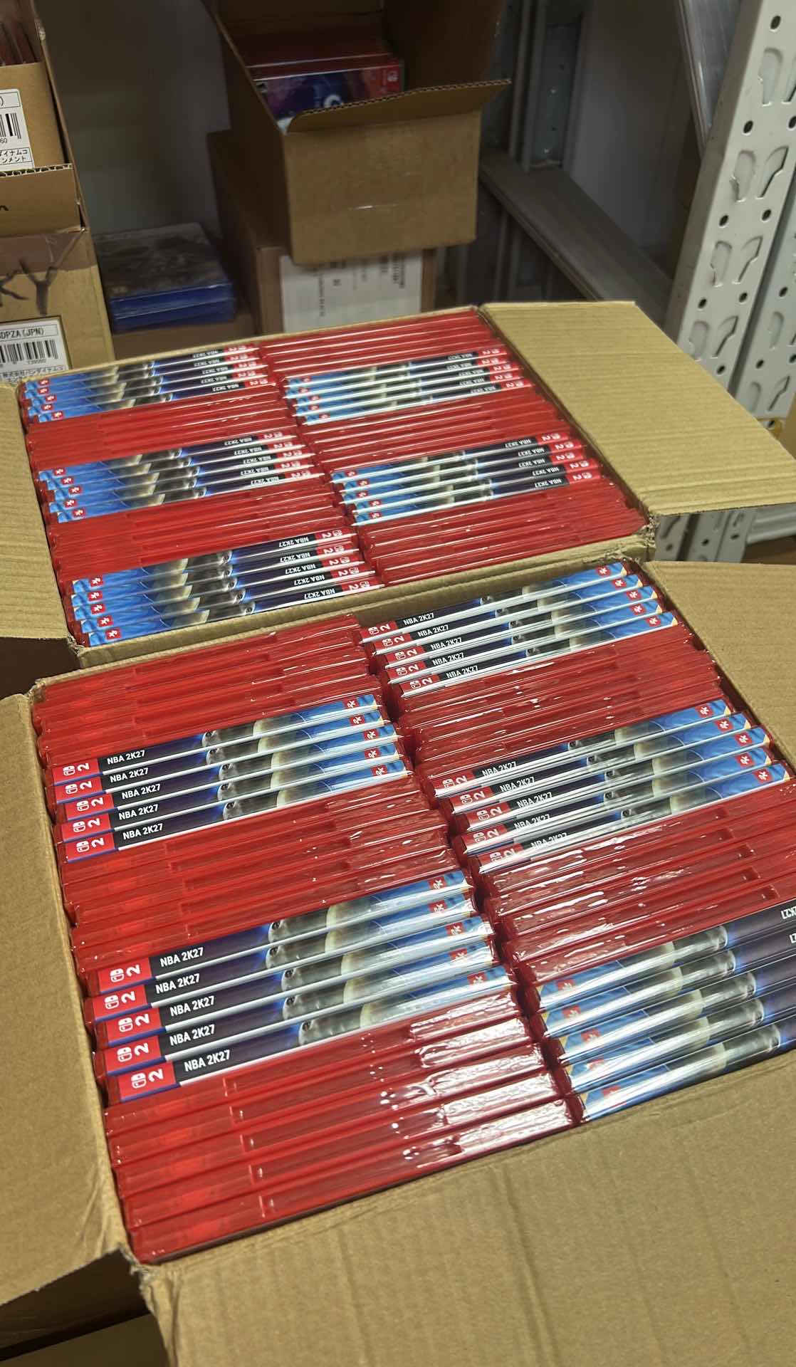 Cartons of sealed NBA 2K27 Nintendo Switch game cases in Sky City Y2K warehouse stock